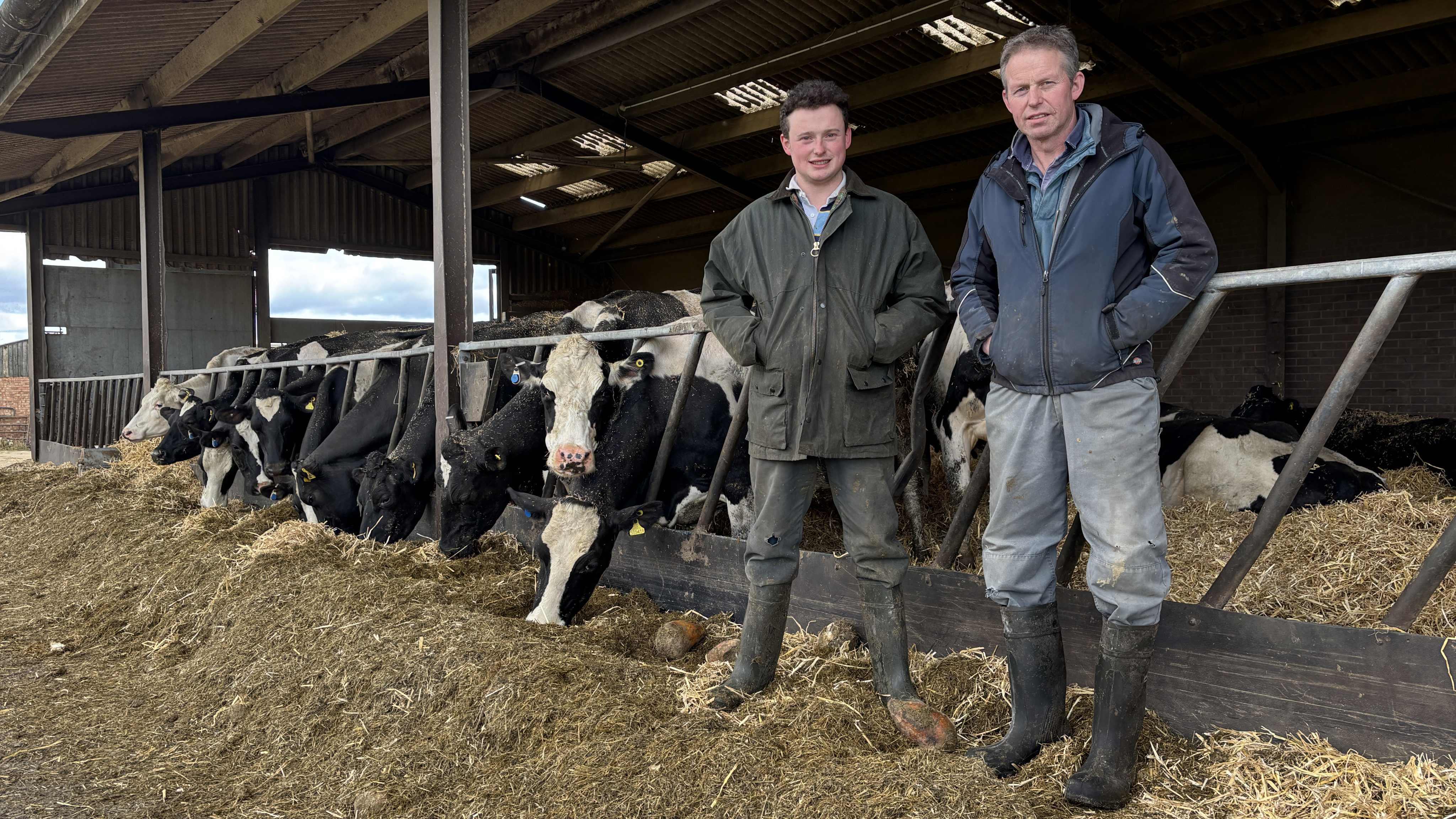 Farm in Leicestershire Two farmers standing in front of the